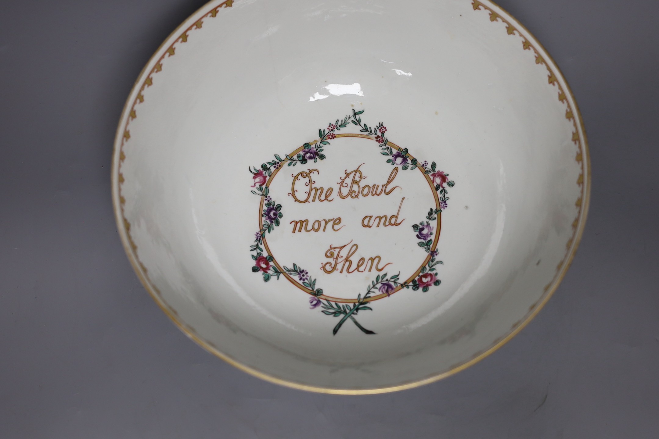 A Sunderland pink lustre sailor's bowl, marked Scott(?), together with a Paris porcelain 'one bowl more and then' bowl, and a 18th century Chinese famille rose hot water pot, tallest 23cm (3)